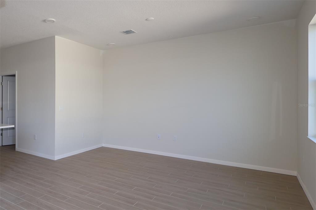 659 Pothos Street Apopka, FL 32703 - Photo 10 of 34 a view of an empty room