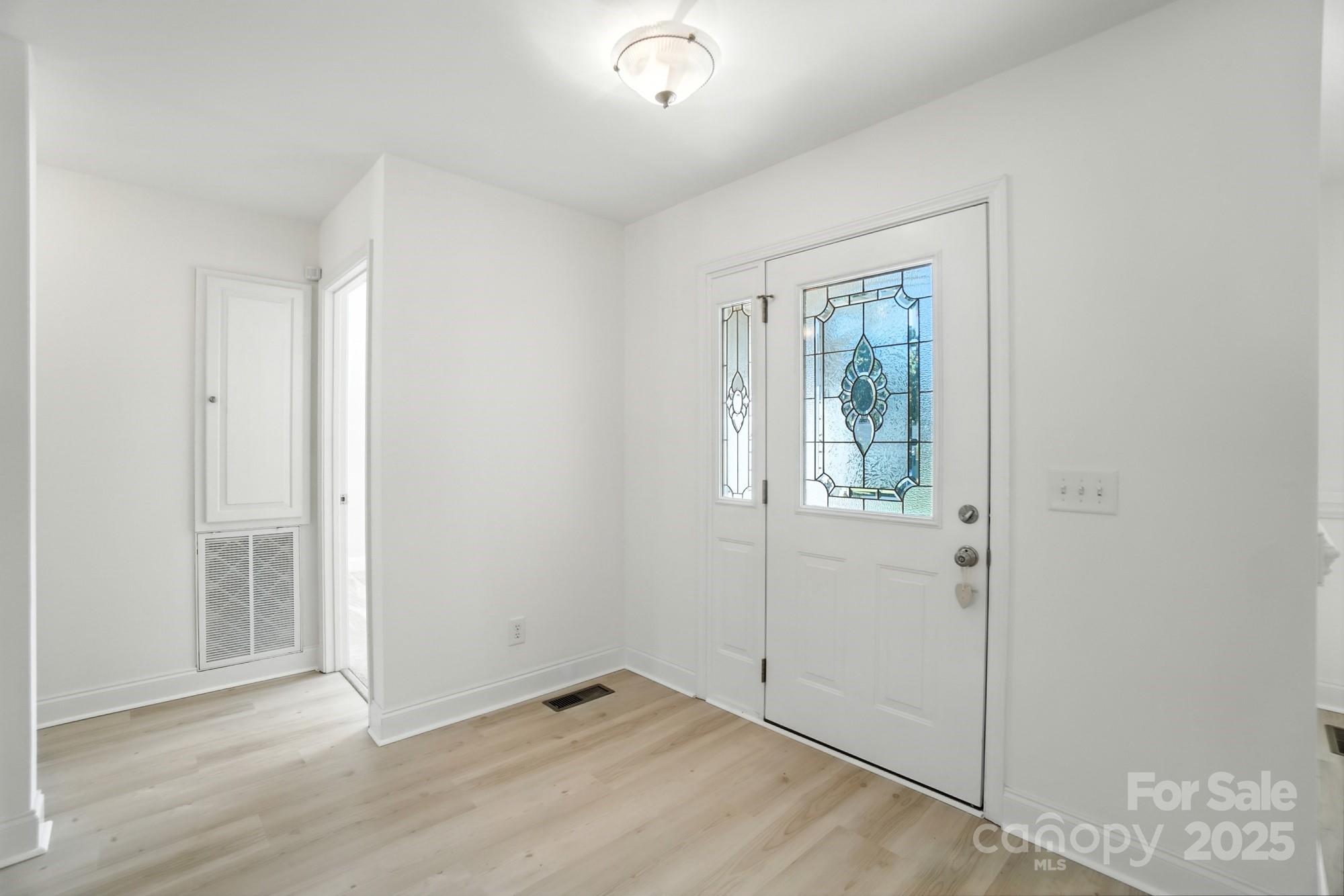 708 Redah Avenue Locust, NC 28097 - Photo 4 of 48 an empty room with windows