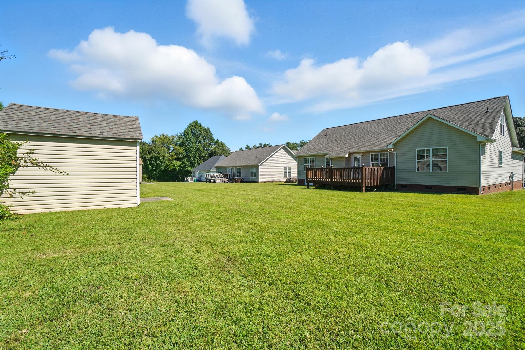708 Redah Avenue Locust, NC 28097 - Photo 44 of 48 a view of a house with a yard