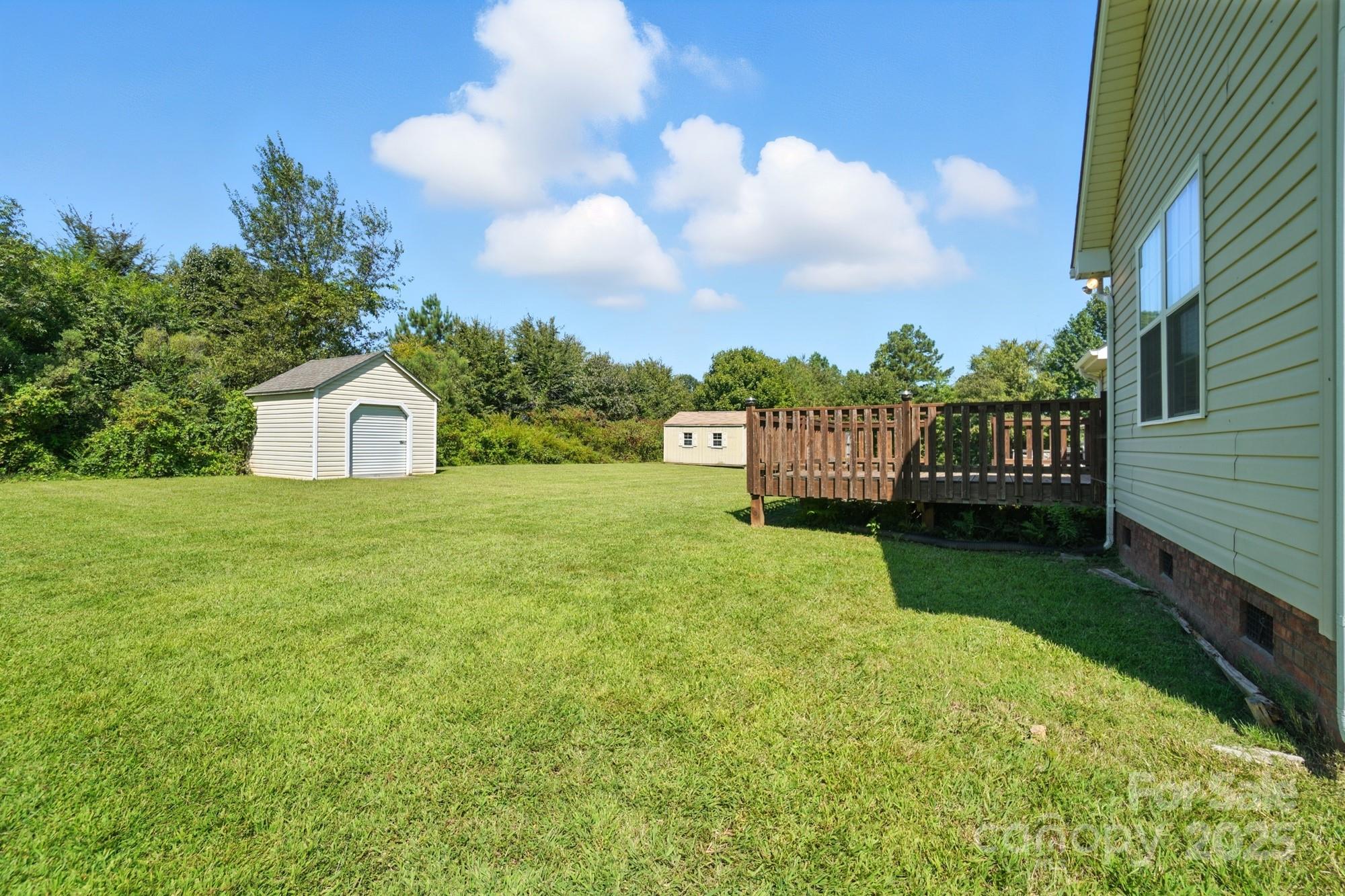 708 Redah Avenue Locust, NC 28097 - Photo 45 of 48 a view of a house with a yard