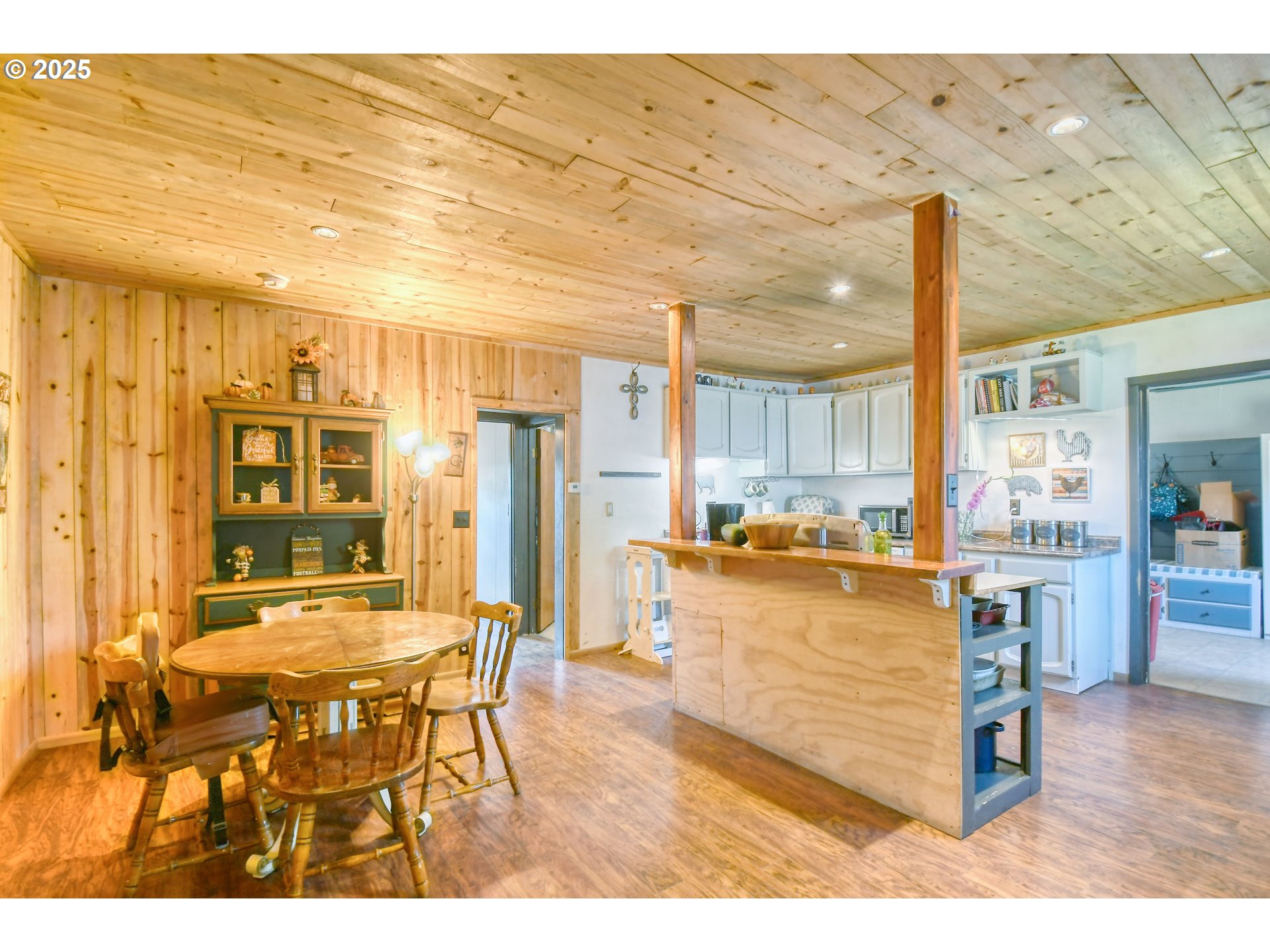 559 Southwest Cedar Street Pilot Rock, OR 97868 - Photo 17 of 42 a living room with stainless steel appliances kitchen island granite countertop furniture and a kitchen view