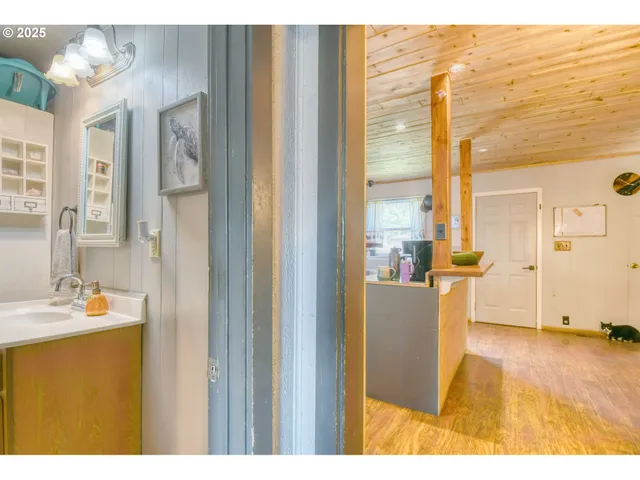 a view of livingroom with washer and dryer