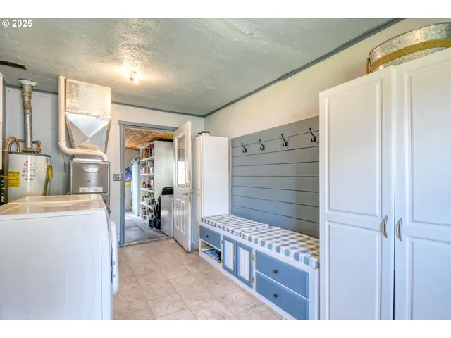 a view of wooden floor and cabinet in a room
