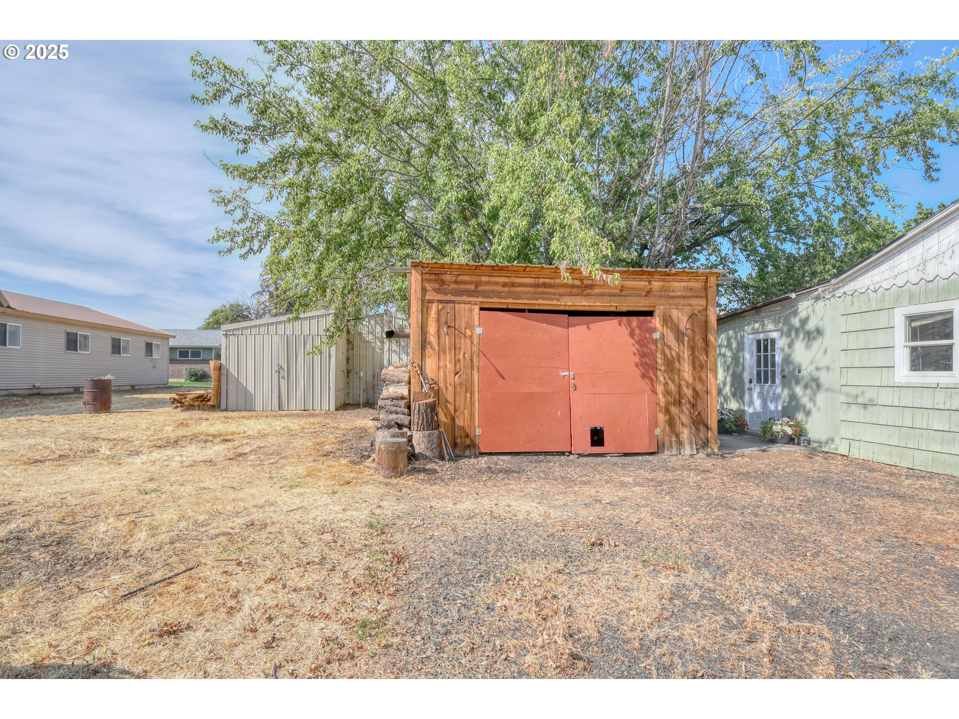 559 Southwest Cedar Street Pilot Rock, OR 97868 - Photo 6 of 42 a view of a yard with a house
