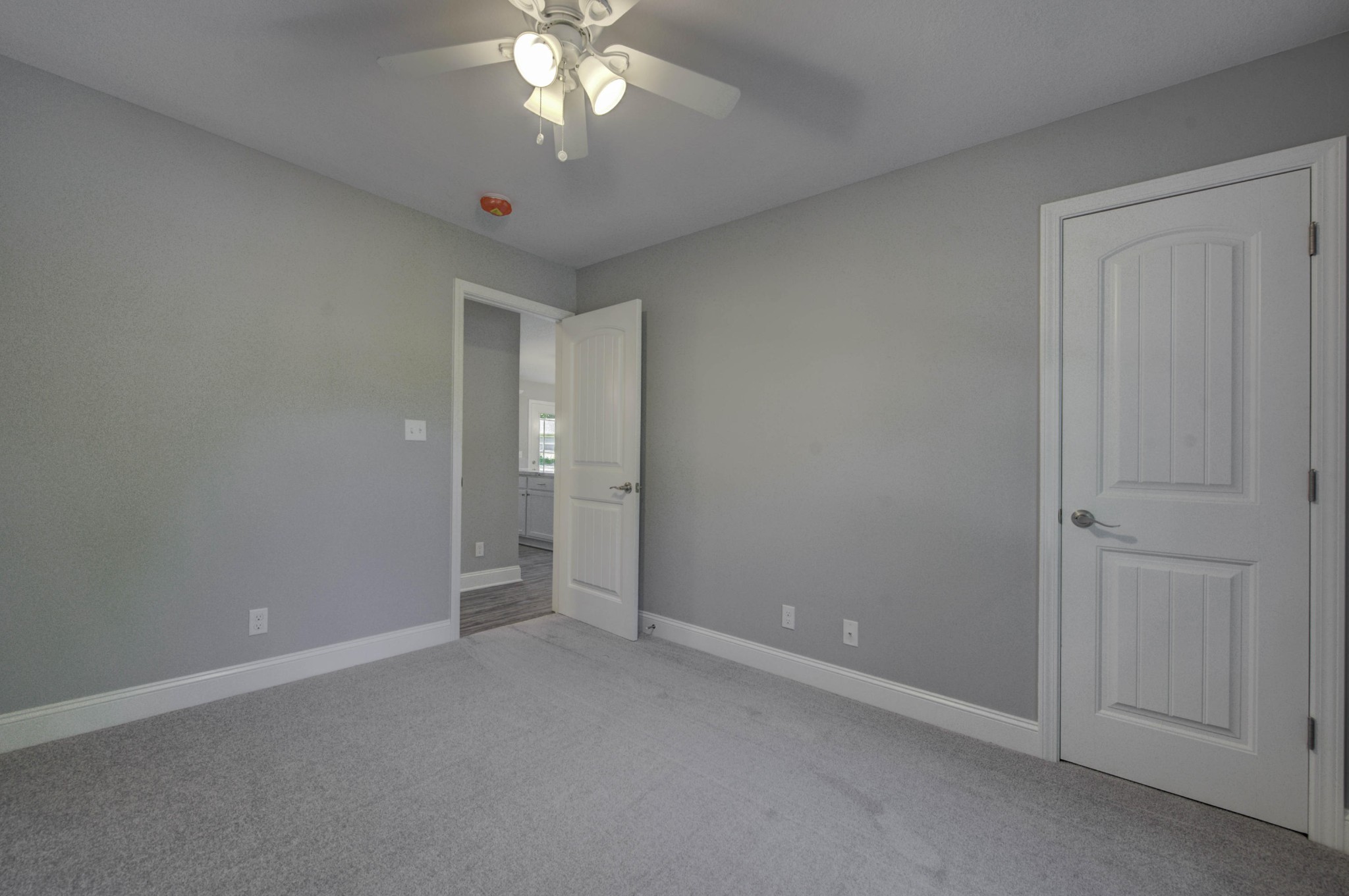 127 West Lincoln Road Oak Ridge, TN 37830 - Photo 18 of 32 an empty room with a chandelier fan