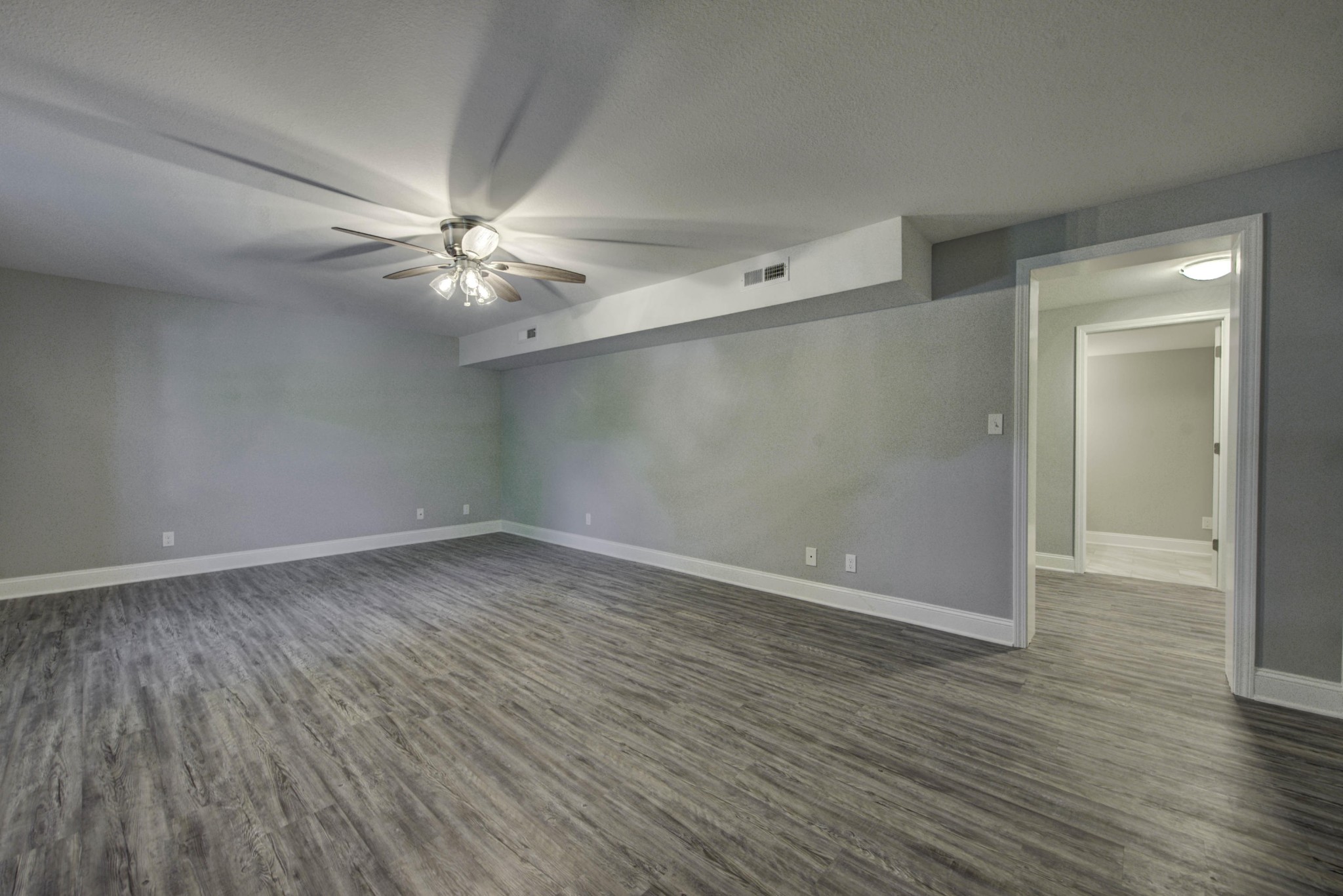 127 West Lincoln Road Oak Ridge, TN 37830 - Photo 23 of 32 a view of an empty room with wooden floor