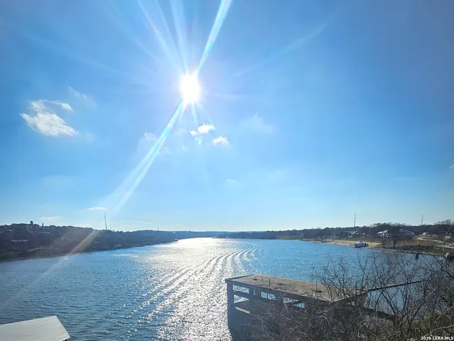 a view of a city with a mountain in the background