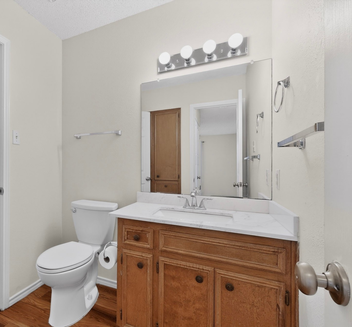 12800 Old San Antonio Road, Unit A Manchaca, TX 78652 - Photo 21 of 28 Functional vanity and ample counter space outfit this well-appointed bathroom.