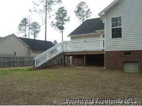 122 Chesapeake Road Cameron, NC 28326 - Photo 6 of 10 a view of a house with a yard