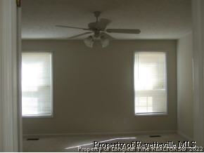 122 Chesapeake Road Cameron, NC 28326 - Photo 7 of 10 a view of an empty room