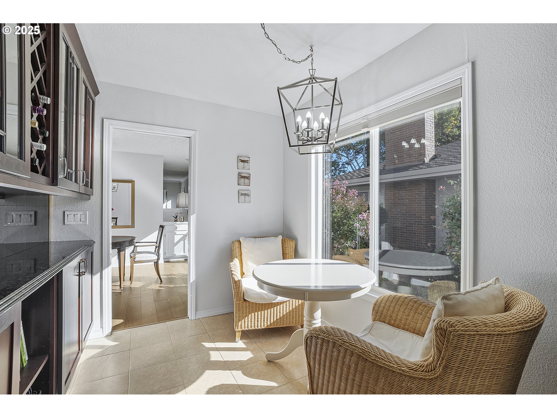 32215 Southwest East Lake Point Wilsonville, OR 97070 - Photo 13 of 47 a living room with furniture and a chandelier