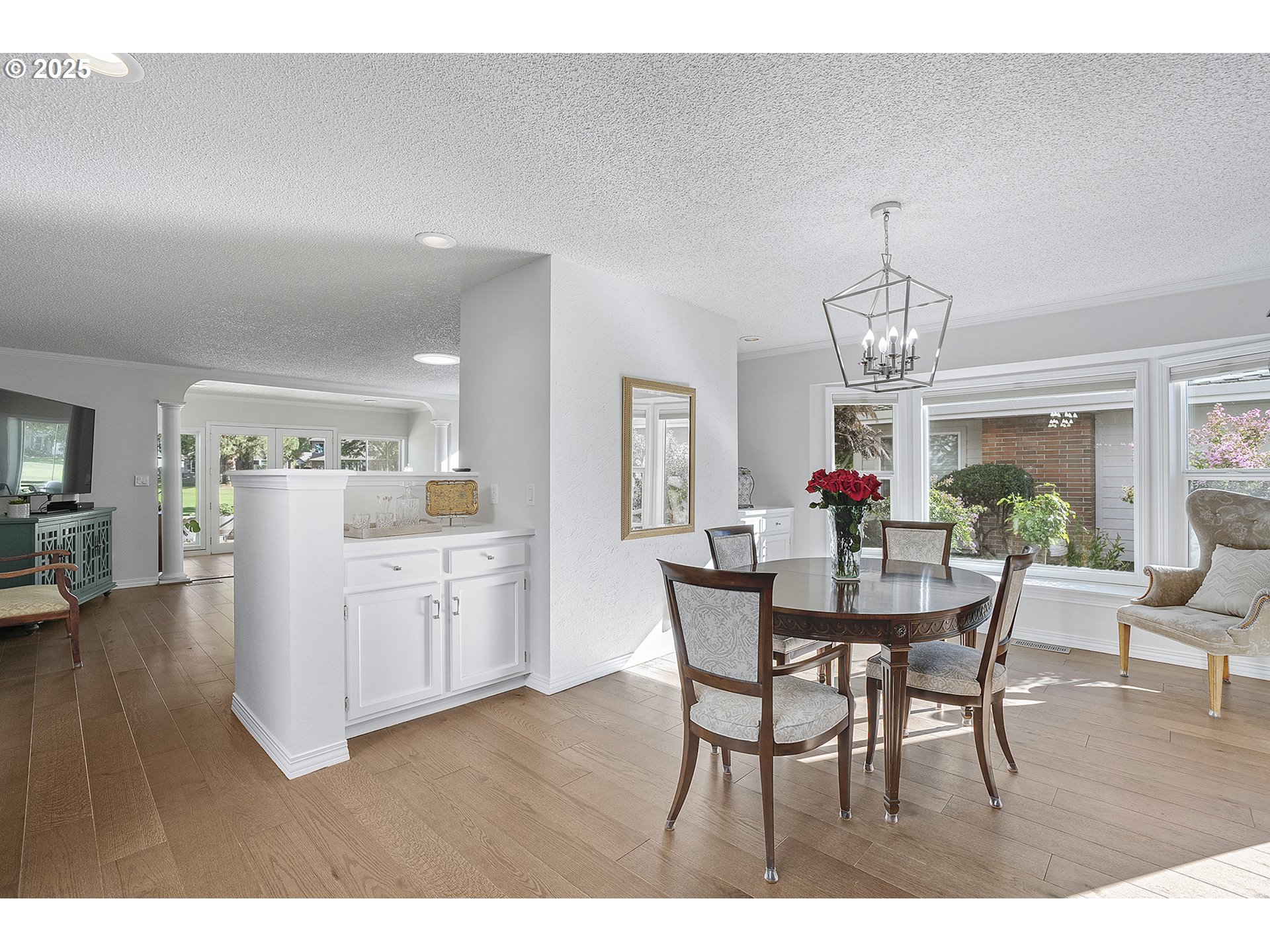 32215 Southwest East Lake Point Wilsonville, OR 97070 - Photo 15 of 47 a view of a dining room with furniture and chandelier