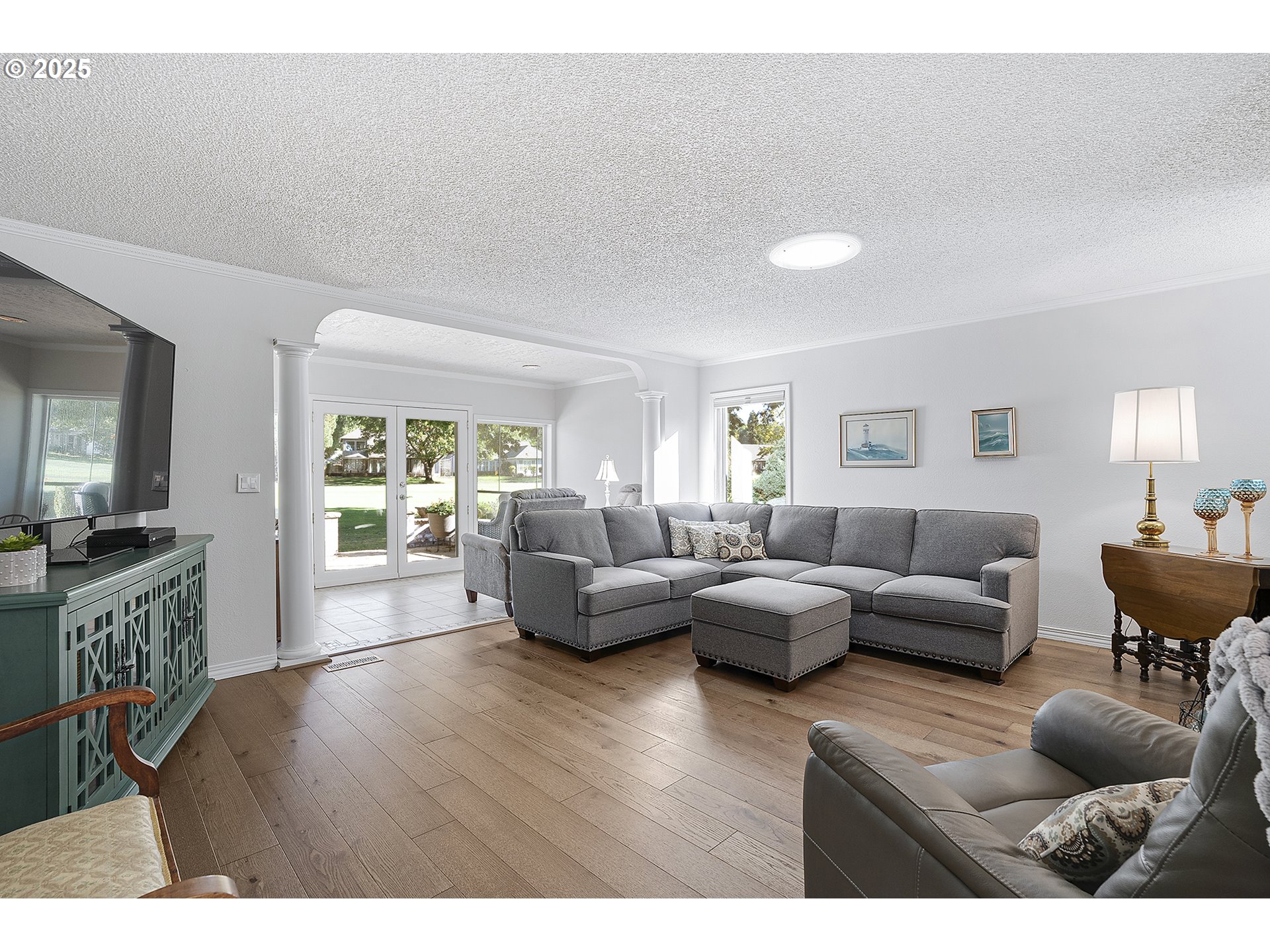 32215 Southwest East Lake Point Wilsonville, OR 97070 - Photo 18 of 47 a living room with furniture and a wooden floor