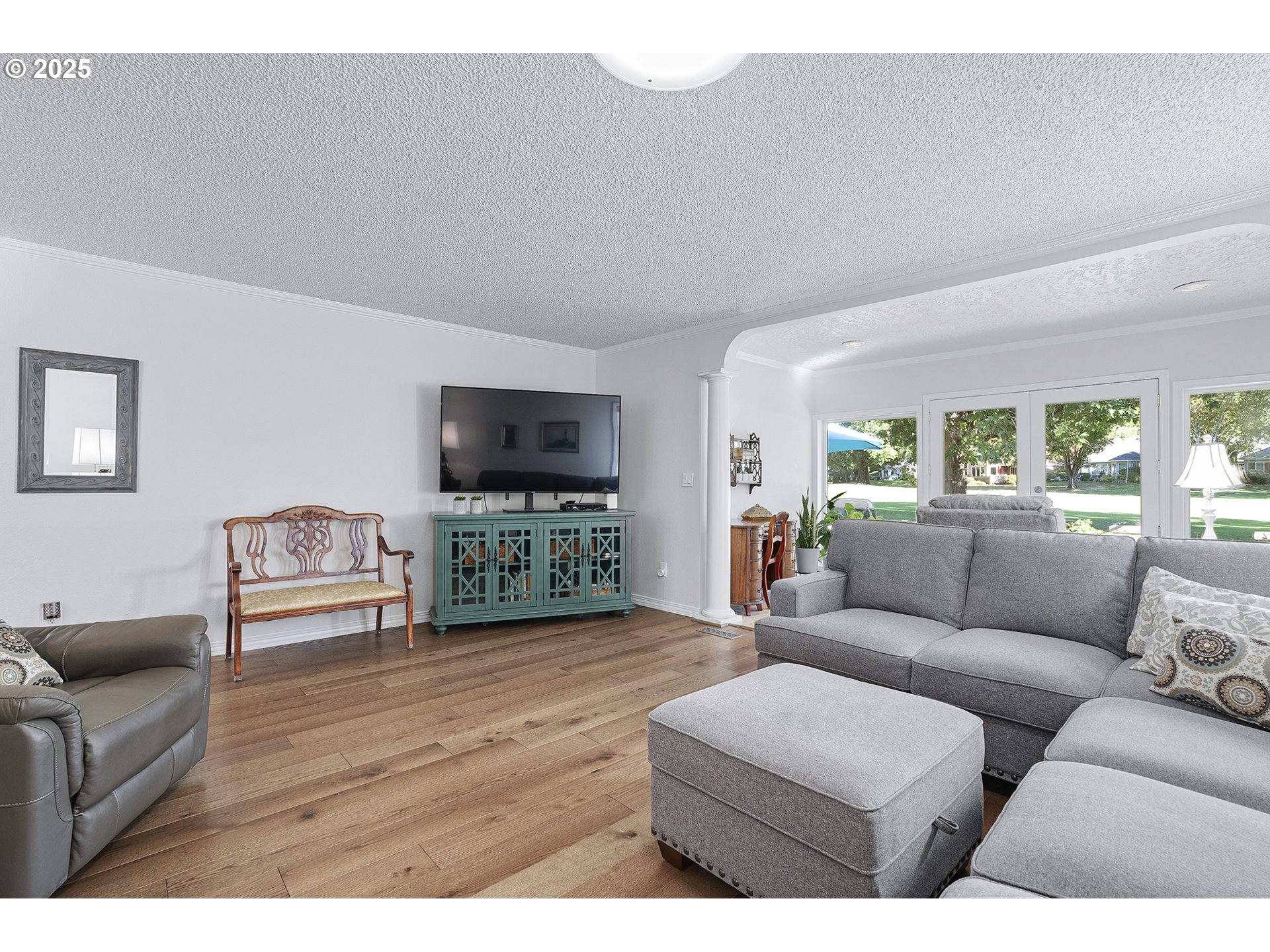 32215 Southwest East Lake Point Wilsonville, OR 97070 - Photo 21 of 47 a living room with furniture and a flat screen tv