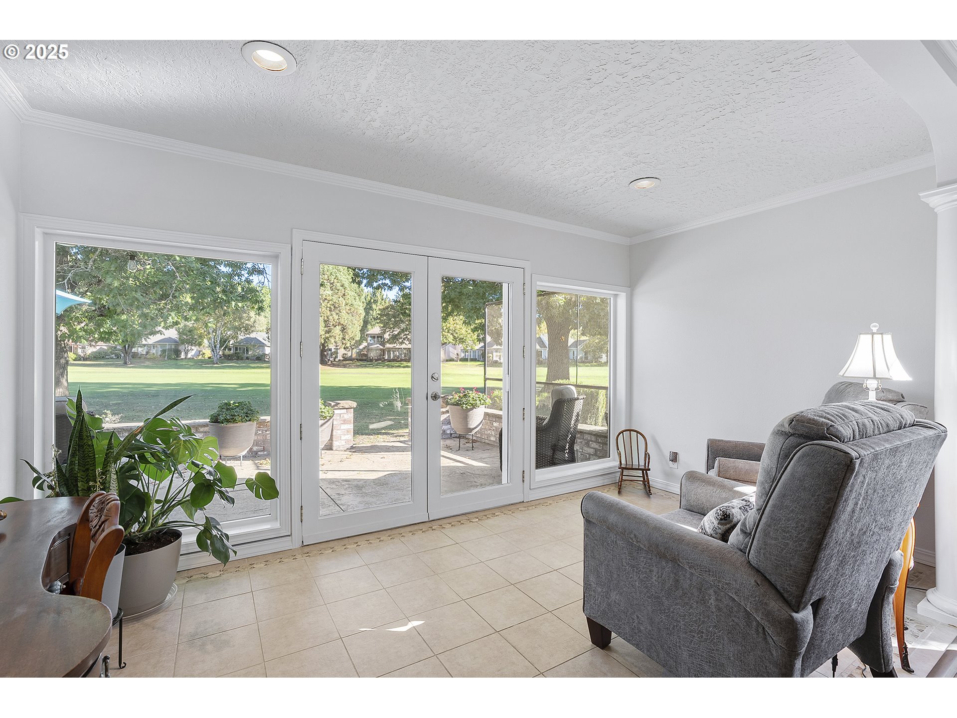 32215 Southwest East Lake Point Wilsonville, OR 97070 - Photo 22 of 47 a living room with furniture and a window