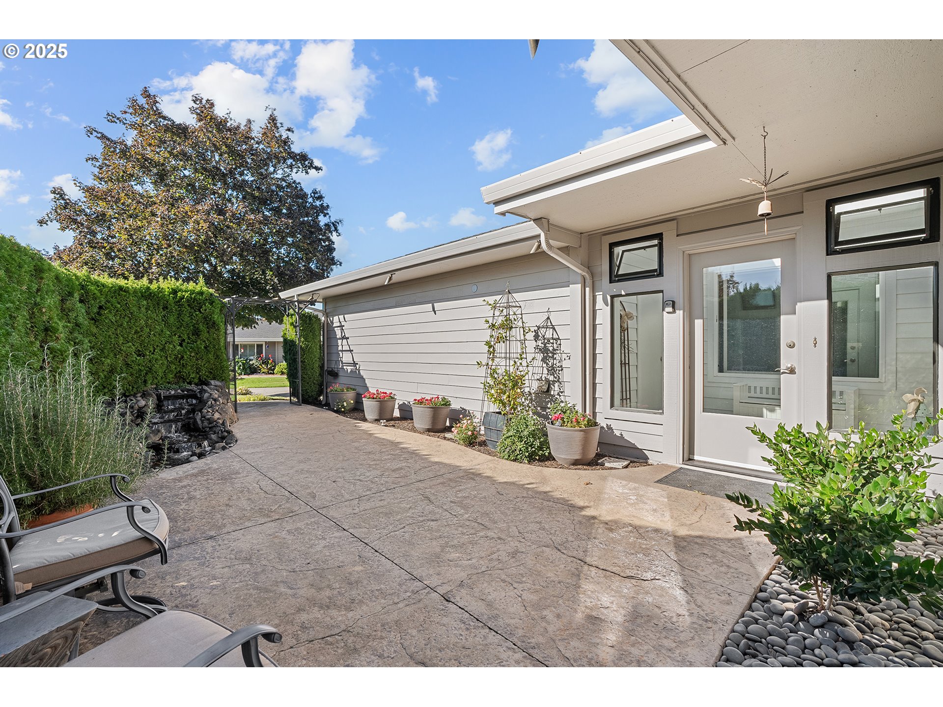 32215 Southwest East Lake Point Wilsonville, OR 97070 - Photo 3 of 47 a view of a house with backyard and porch
