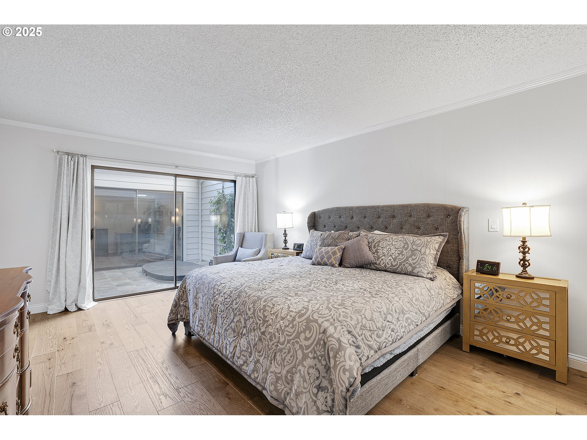 32215 Southwest East Lake Point Wilsonville, OR 97070 - Photo 31 of 47 a bedroom with a bed and a large window