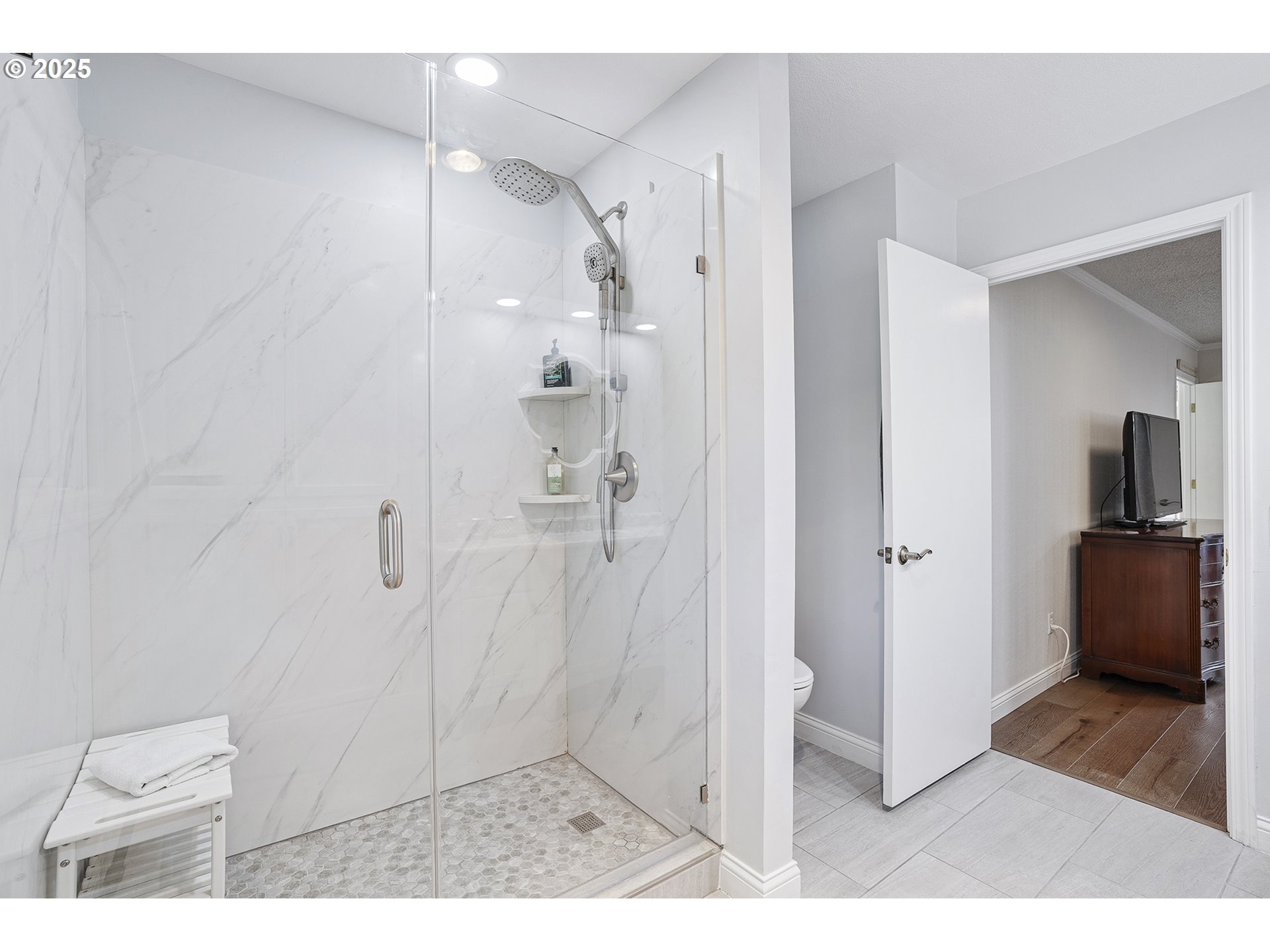 32215 Southwest East Lake Point Wilsonville, OR 97070 - Photo 34 of 47 a bathroom with a shower and a toilet