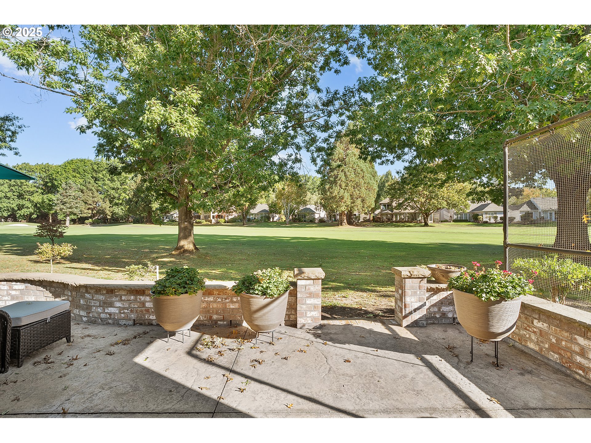 32215 Southwest East Lake Point Wilsonville, OR 97070 - Photo 39 of 47 a view of a lake with a table and chairs