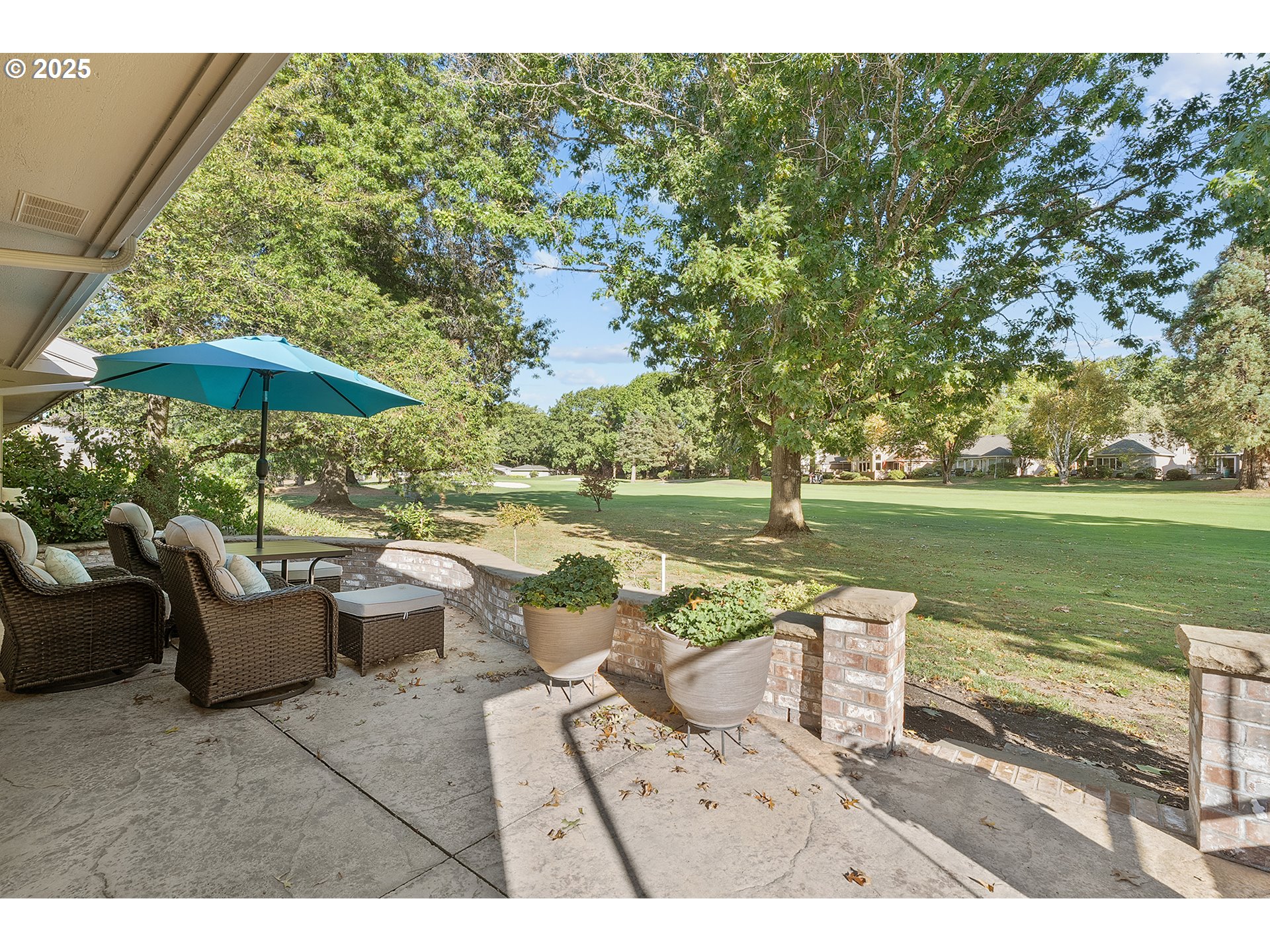 32215 Southwest East Lake Point Wilsonville, OR 97070 - Photo 40 of 47 a view of a patio with furniture and a yard