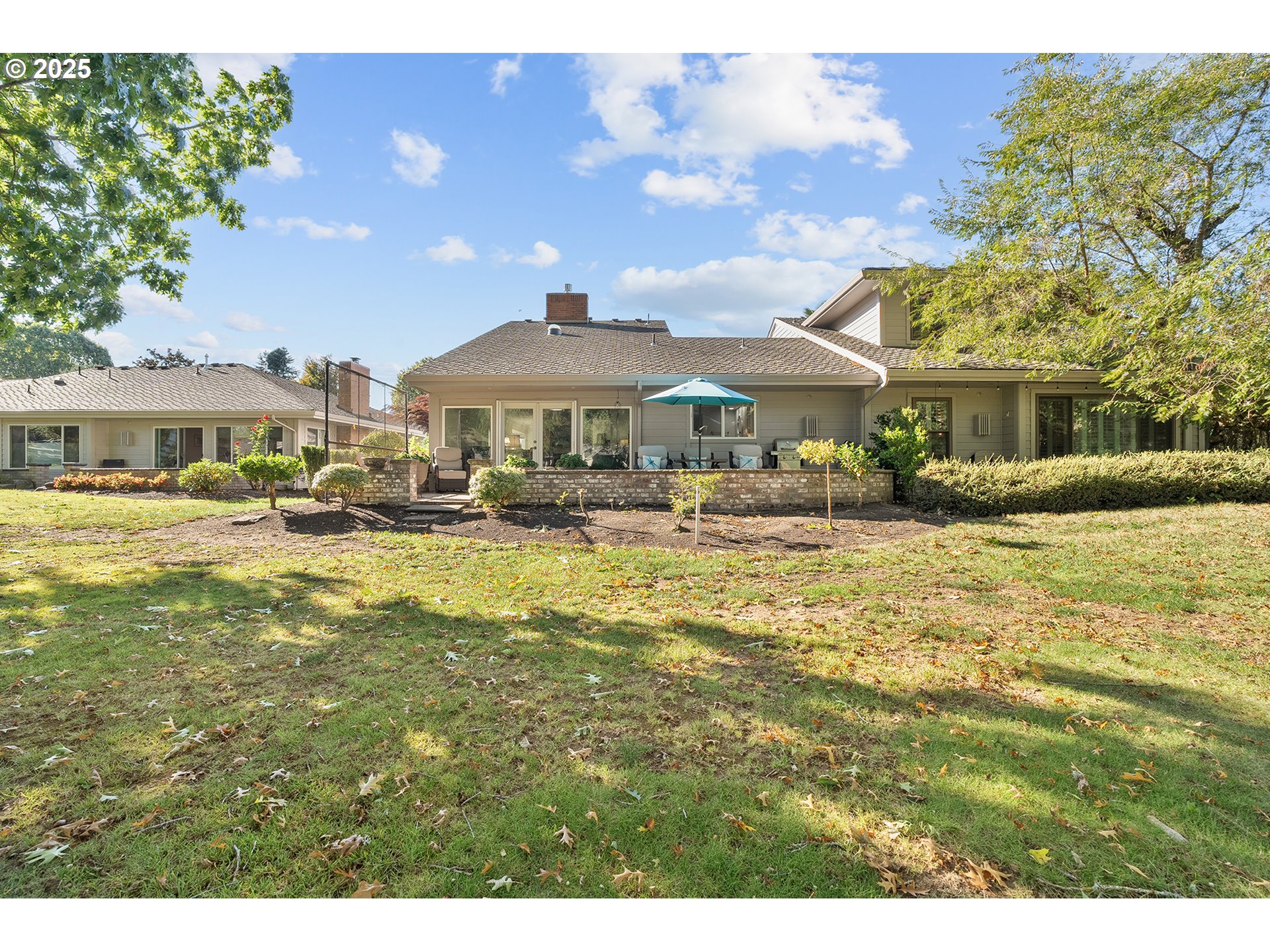 32215 Southwest East Lake Point Wilsonville, OR 97070 - Photo 42 of 47 a front view of residential houses with yard and green space