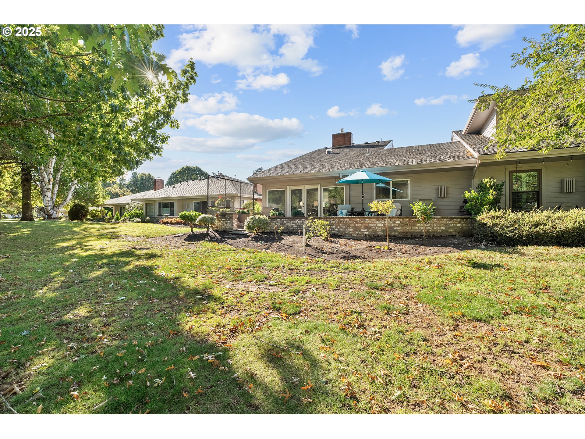 32215 Southwest East Lake Point Wilsonville, OR 97070 - Photo 43 of 47 a front view of a house with a yard