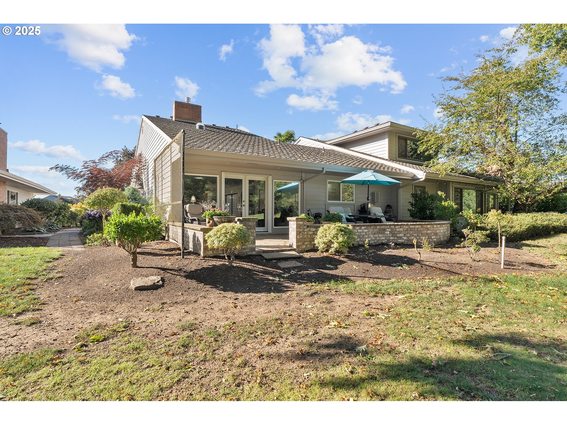 32215 Southwest East Lake Point Wilsonville, OR 97070 - Photo 44 of 47 a front view of a house with swimming pool and furniture