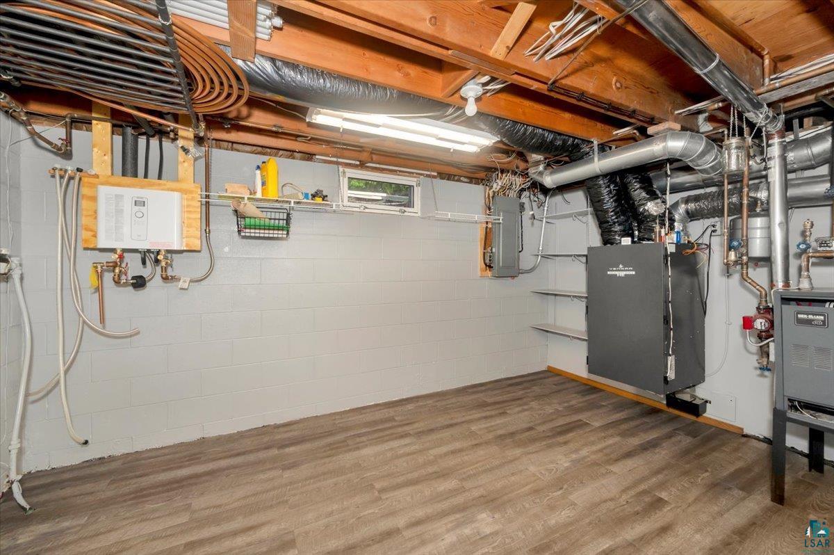 5219 West Arrowhead Road Hermantown, MN 55811 - Photo 27 of 35 Basement with hardwood / wood-style floors