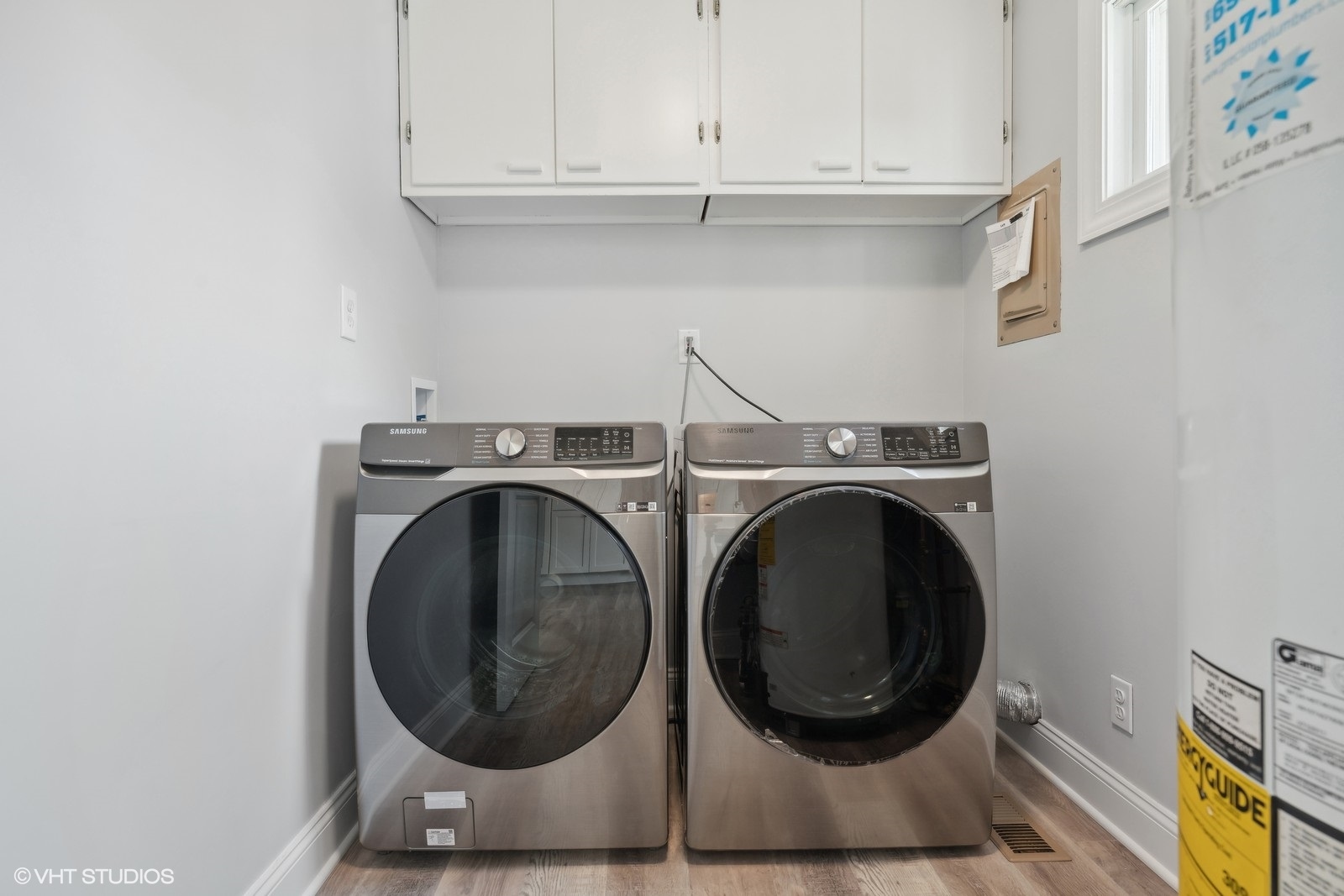 129 Springleaf Drive Bolingbrook, IL 60440 - Photo 11 of 14 a utility room with dryer and washer