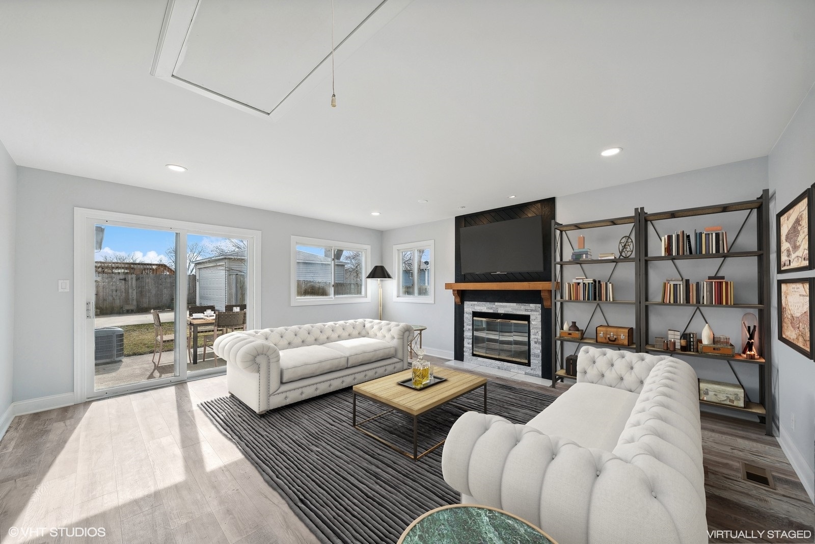 129 Springleaf Drive Bolingbrook, IL 60440 - Photo 13 of 14 a living room with fireplace furniture and a flat screen tv