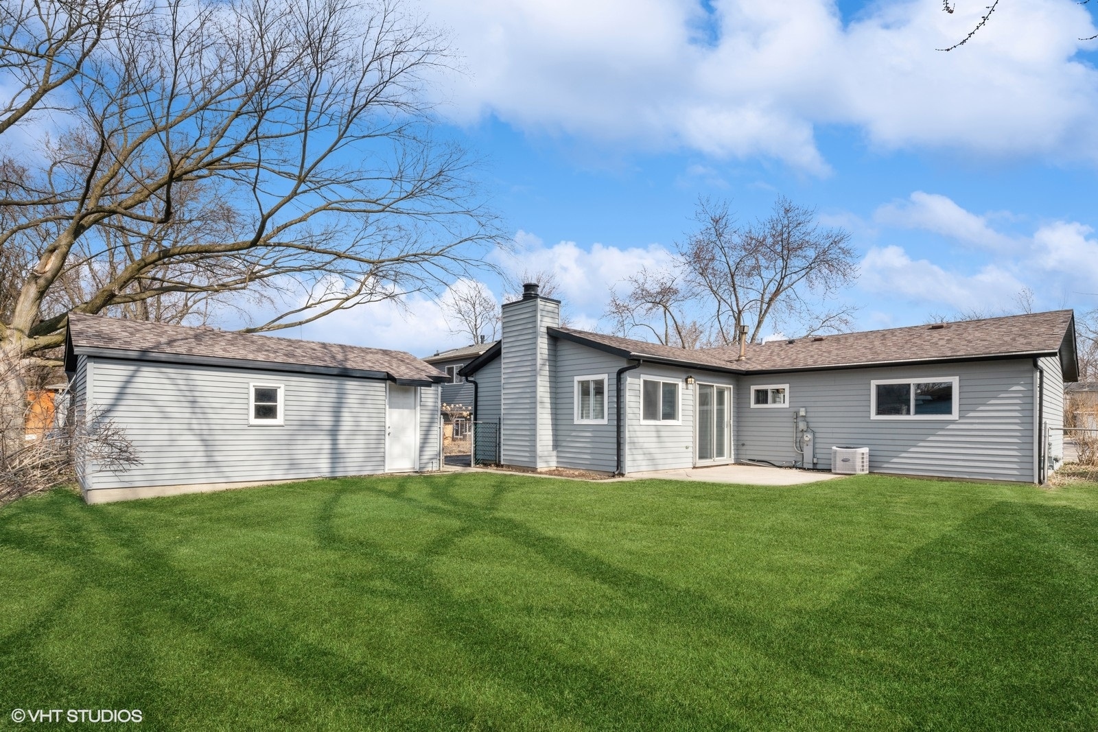 129 Springleaf Drive Bolingbrook, IL 60440 - Photo 14 of 14 a front view of house with yard and green space