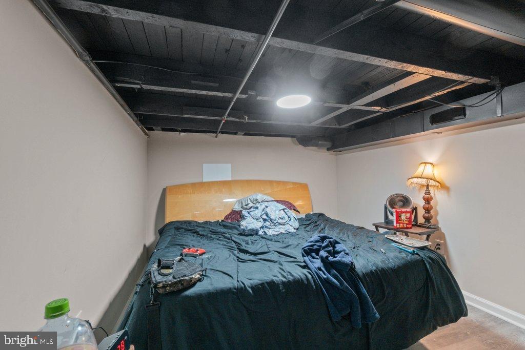 1913 Christian Street Baltimore, MD 21223 - Photo 15 of 18 Cozy basement retreat with modern charm.