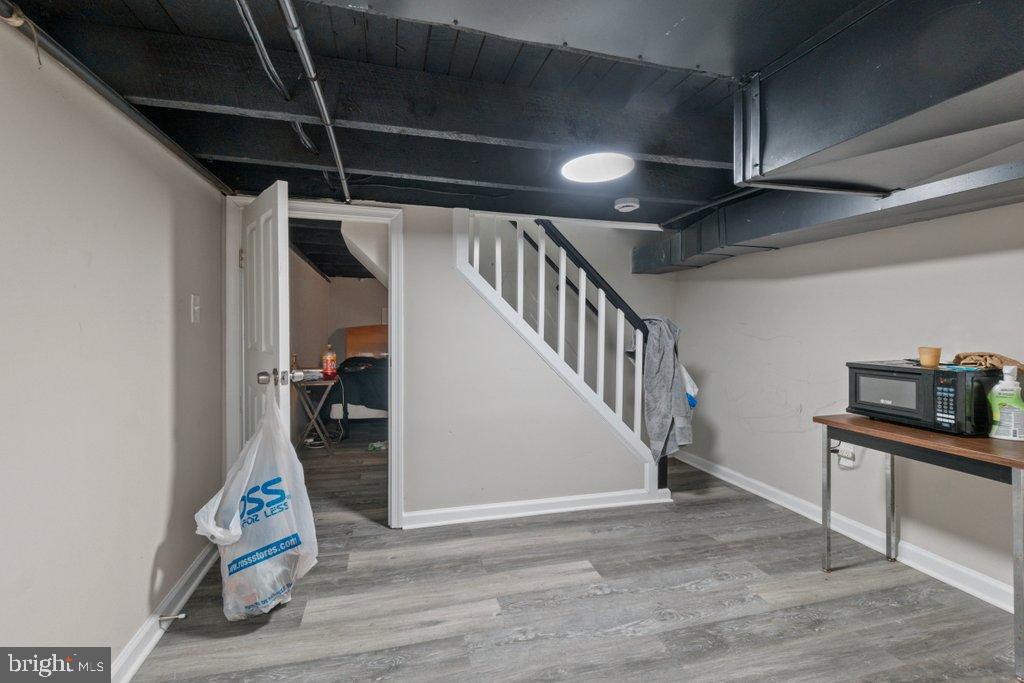 1913 Christian Street Baltimore, MD 21223 - Photo 16 of 18 Versatile basement space with modern finishes.
