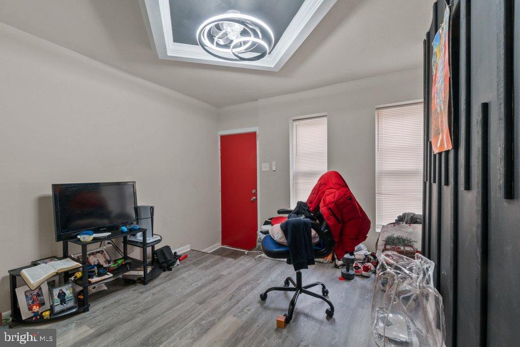 1913 Christian Street Baltimore, MD 21223 - Photo 5 of 18 Vibrant space with bold red accents.