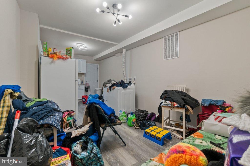 1913 Christian Street Baltimore, MD 21223 - Photo 6 of 18 Cluttered space brimming with potential.