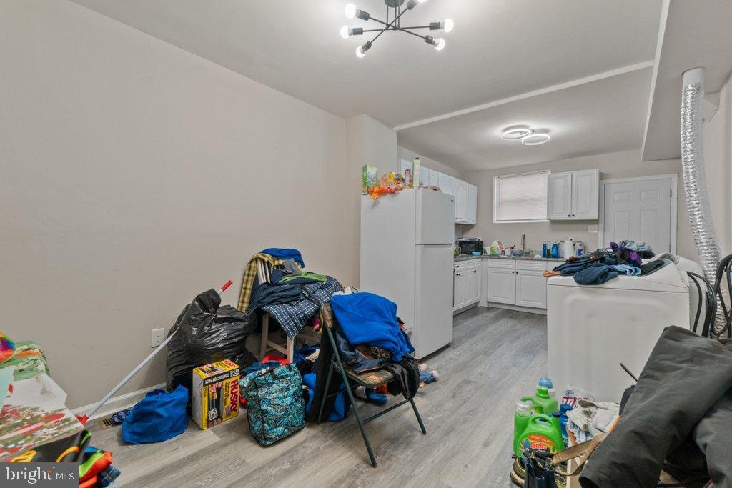 1913 Christian Street Baltimore, MD 21223 - Photo 7 of 18 Cluttered space with potential for renewal.