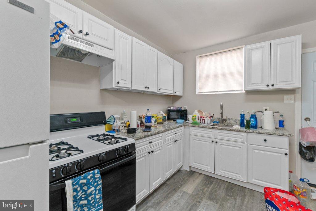 1913 Christian Street Baltimore, MD 21223 - Photo 8 of 18 Bright and functional kitchen space.