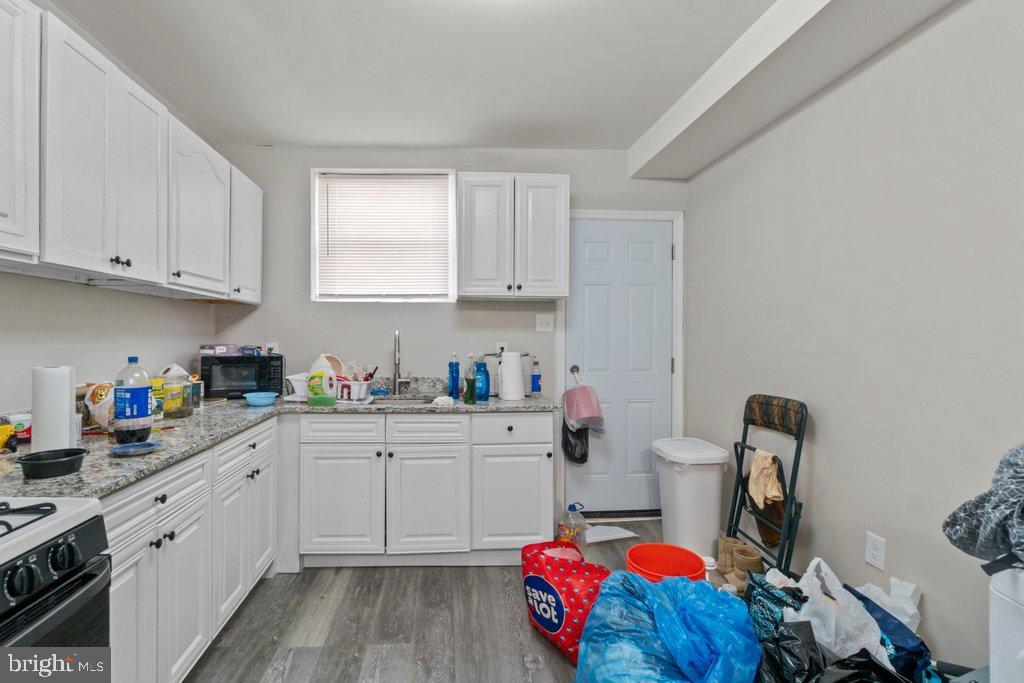 1913 Christian Street Baltimore, MD 21223 - Photo 9 of 18 Bright kitchen with modern cabinetry.