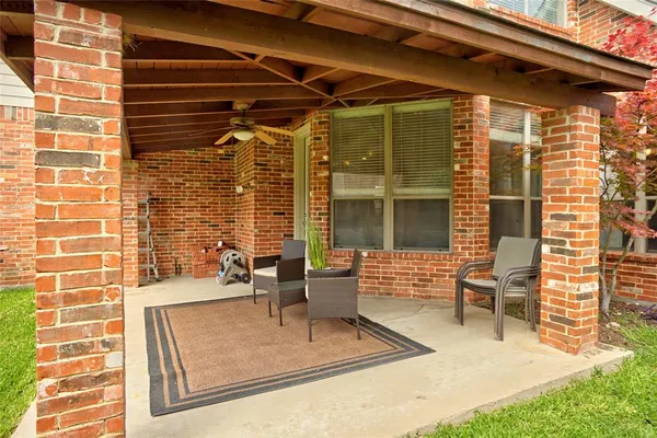 a building outdoor space with patio furniture