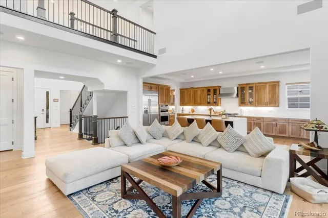 a living room with furniture and a rug