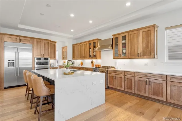 a kitchen with counter top space and appliances