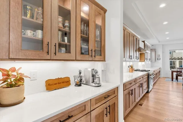 a kitchen with stainless steel appliances a sink and a cabinets