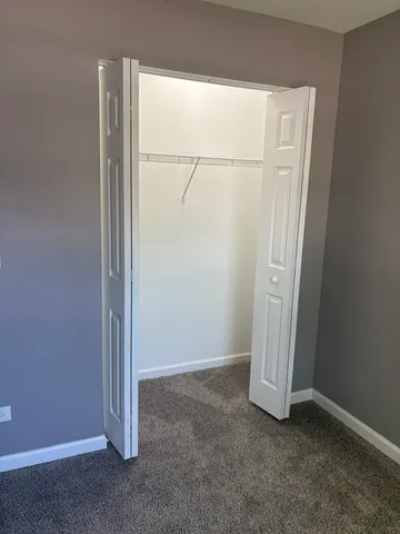 a bathroom with a sink vanity and mirror