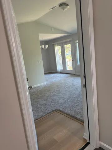 a view of an empty room and window