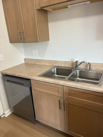 a kitchen with a stove and a microwave