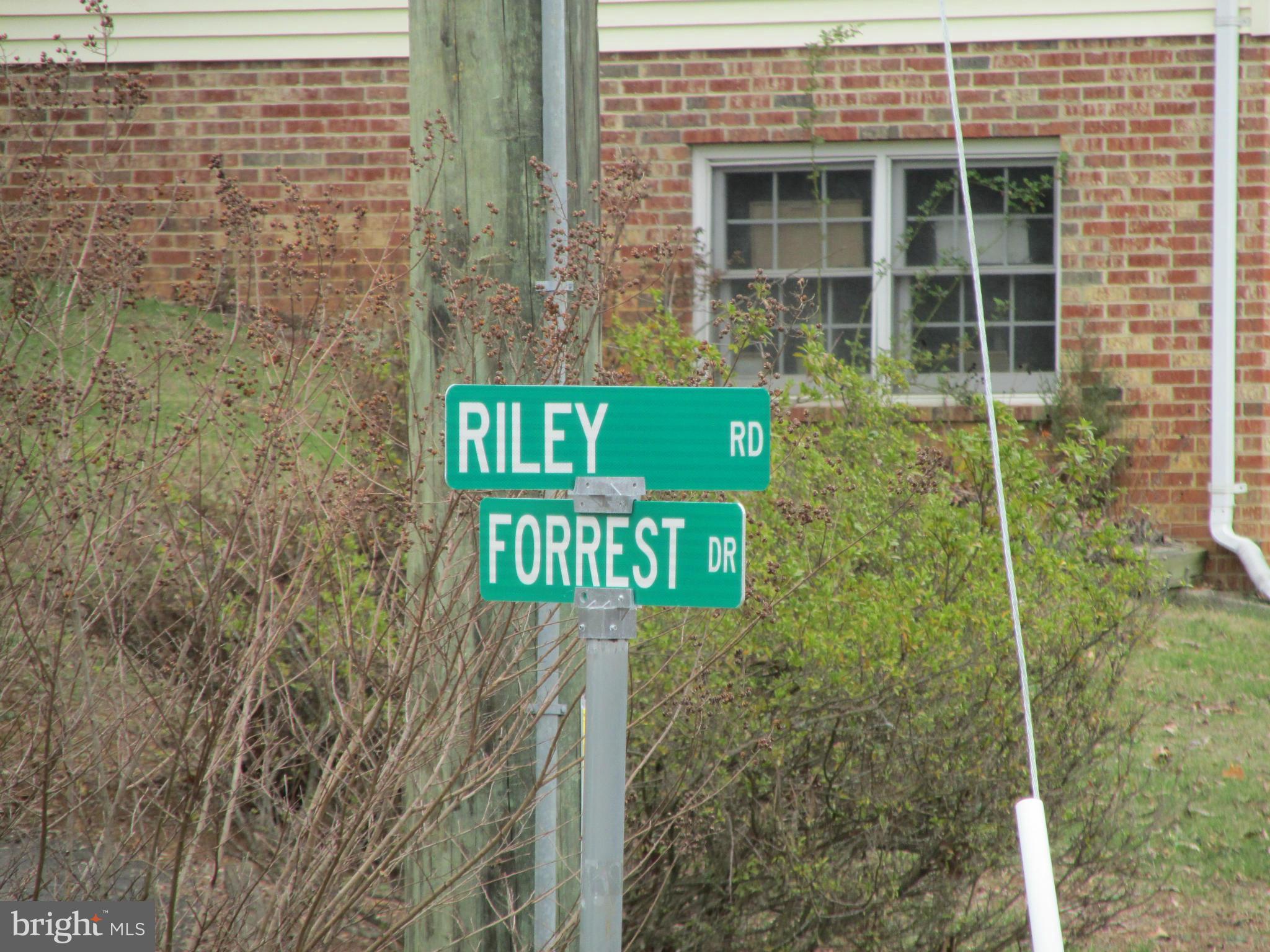 Riley Road Warrenton, VA 20187 - Photo 5 of 13 a sign board with brick walls