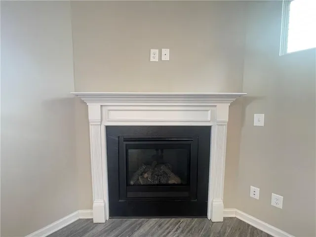 a living room with a fireplace