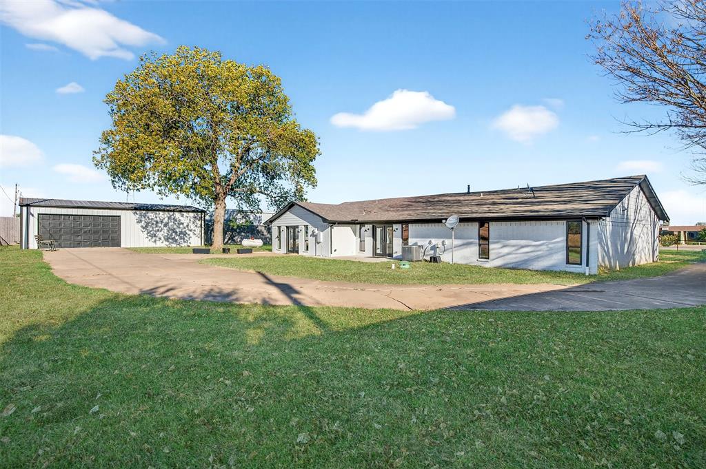 616 East Bells Boulevard Bells, TX 75414 - Photo 29 of 39 a view of house with swimming pool