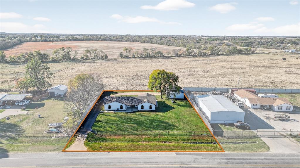 616 East Bells Boulevard Bells, TX 75414 - Photo 31 of 39 a view of a lake with a yard