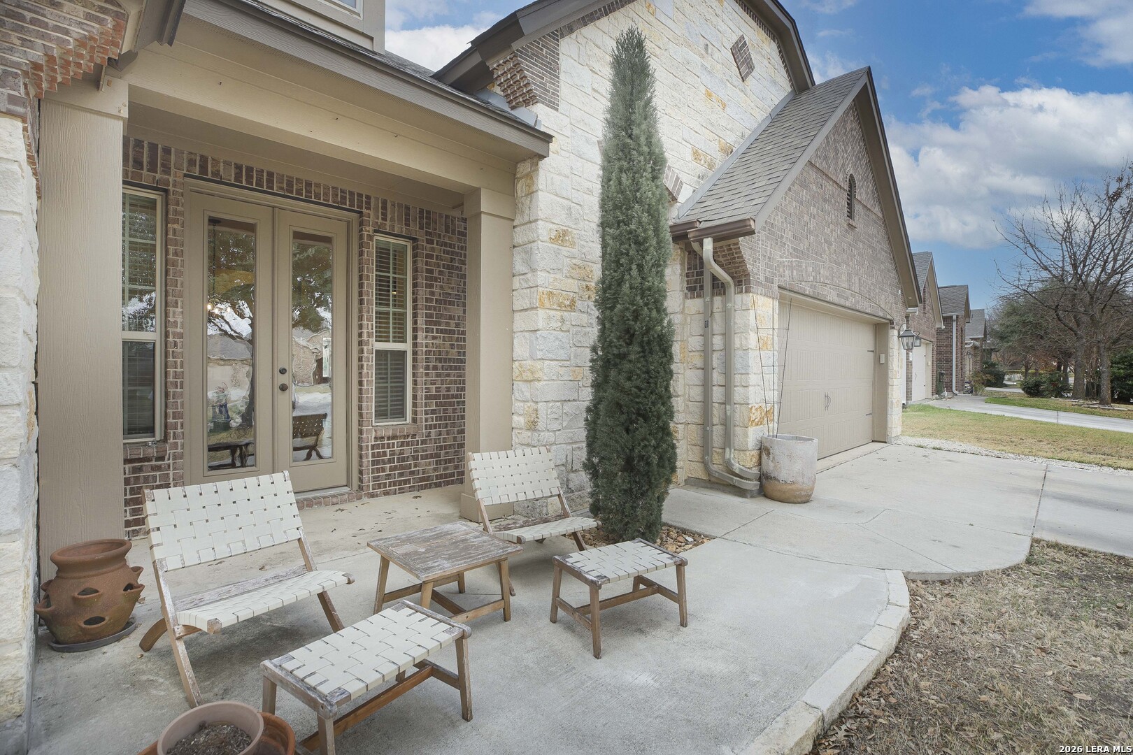 3806 Brahman Road Bulverde, TX 78163 - Photo 2 of 36 a building outdoor space with patio furniture